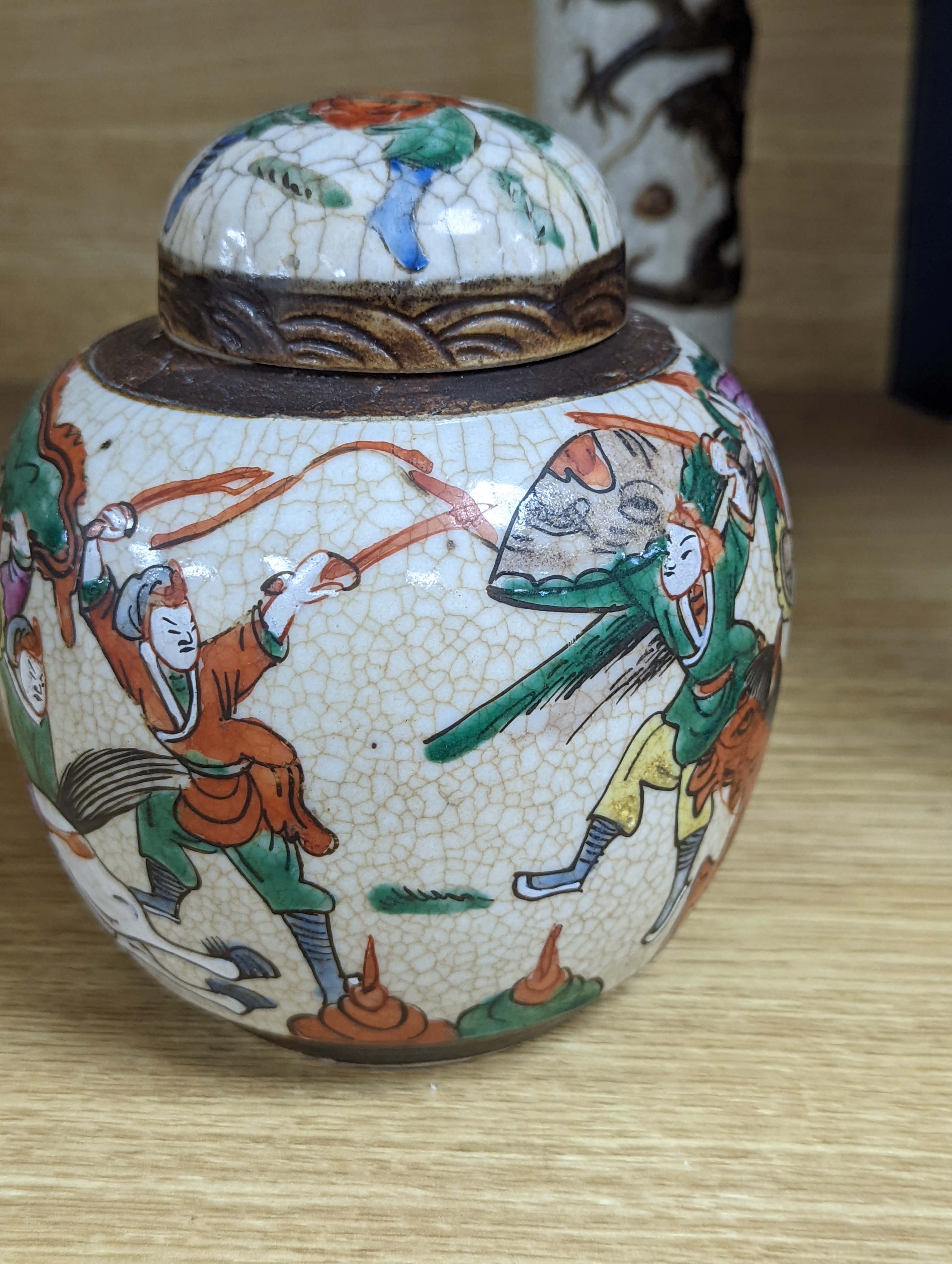 A Chinese famille verte crackle glaze jar and cover, 14.5cm, two famille rose dishes and a crackle glaze ‘dragon’ vase, all late 19th/early 20th century